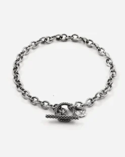 BRACCIALE CATENA RIGATA CON T-BAR PUNTINATA IN ARGENTO