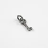 CIONDOLO CHARM CHIAVE PUNTINATA